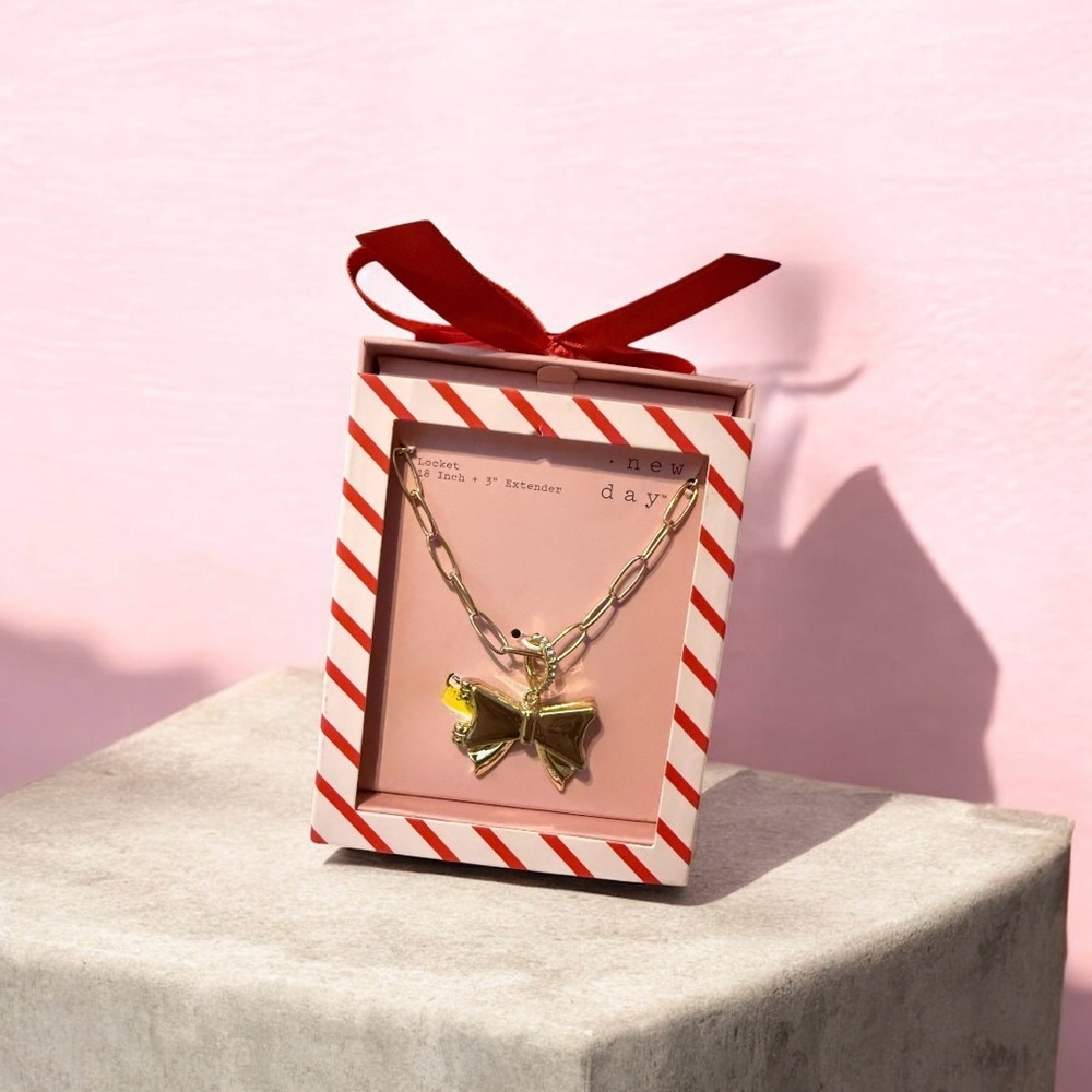 A New Day Gold Bow Pendant Necklace